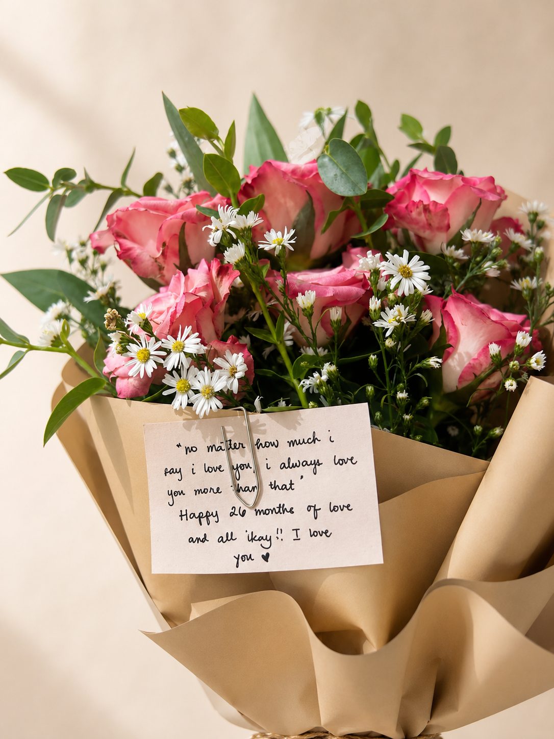 Romantic bouquet with a handwritten note card, ready for delivery in Fes