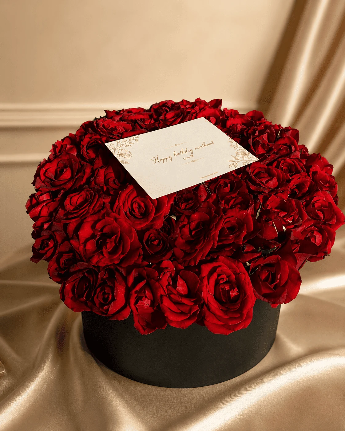 Black hatbox of red roses with a personalised birthday card, flower delivery Meknes