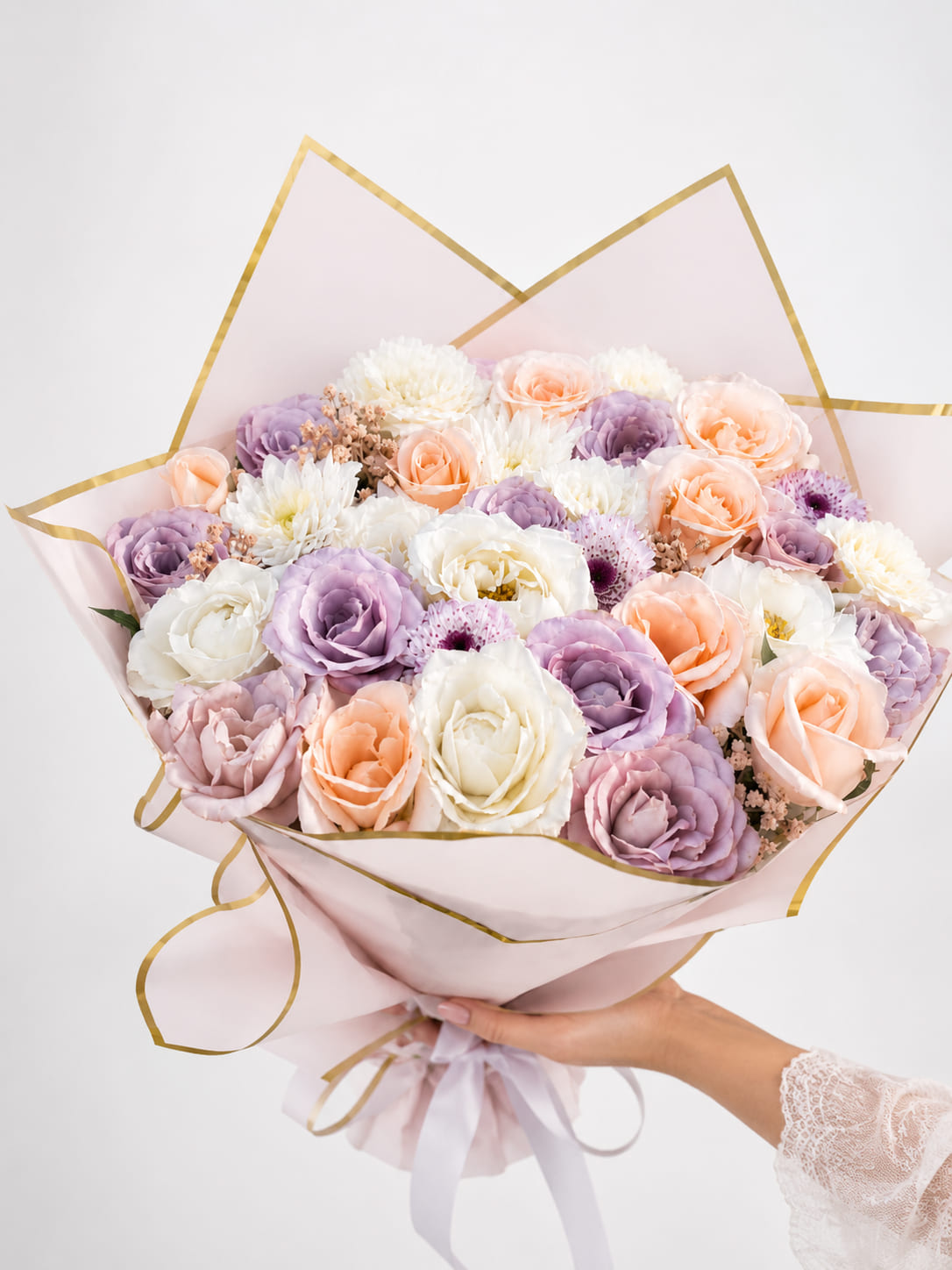 Pastel bouquet of lavender, peach and ivory roses with white blooms, flower delivery Meknes