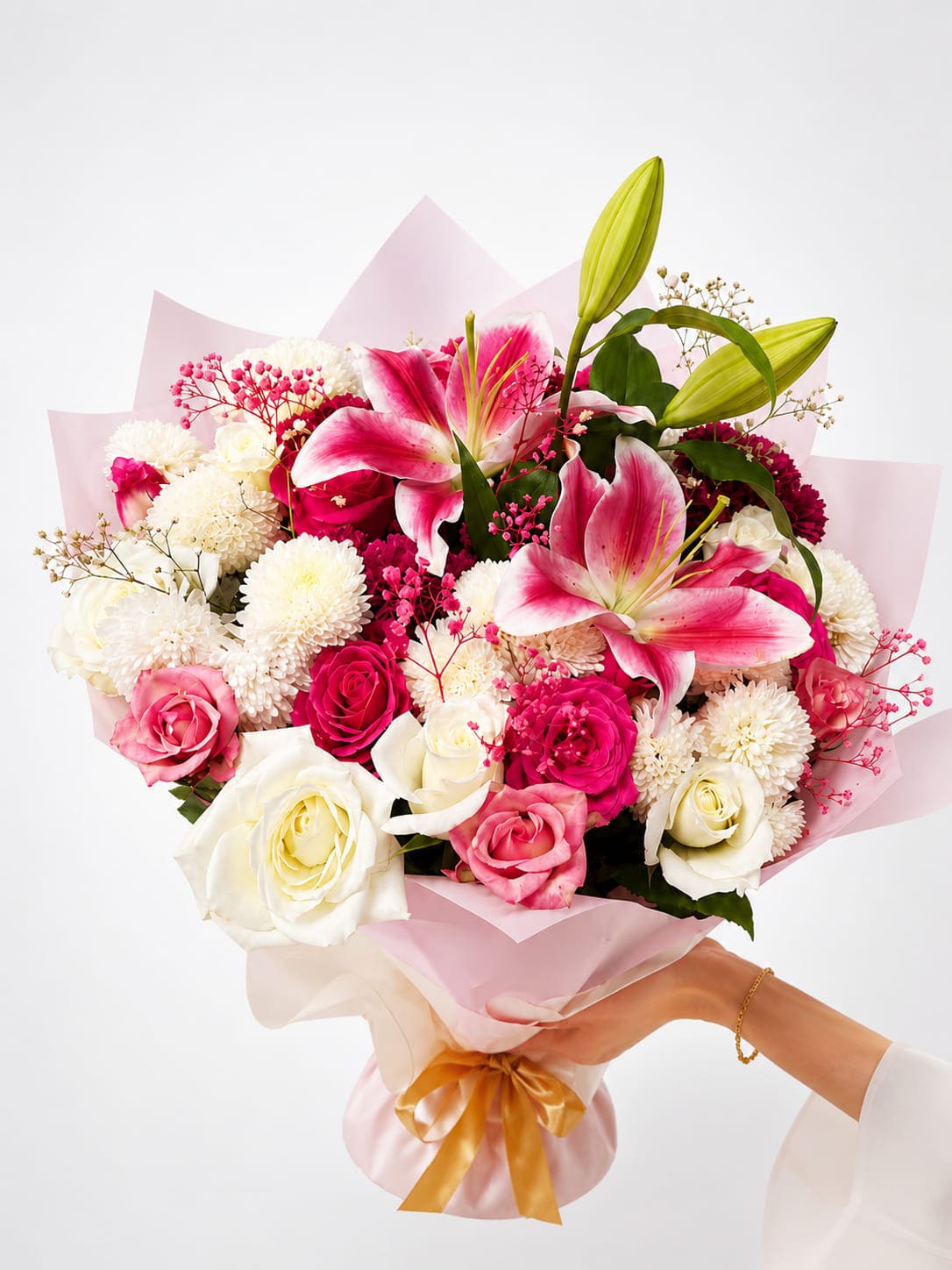 Pink lily, rose and white chrysanthemum bouquet in blush wrapping, flower delivery Fes